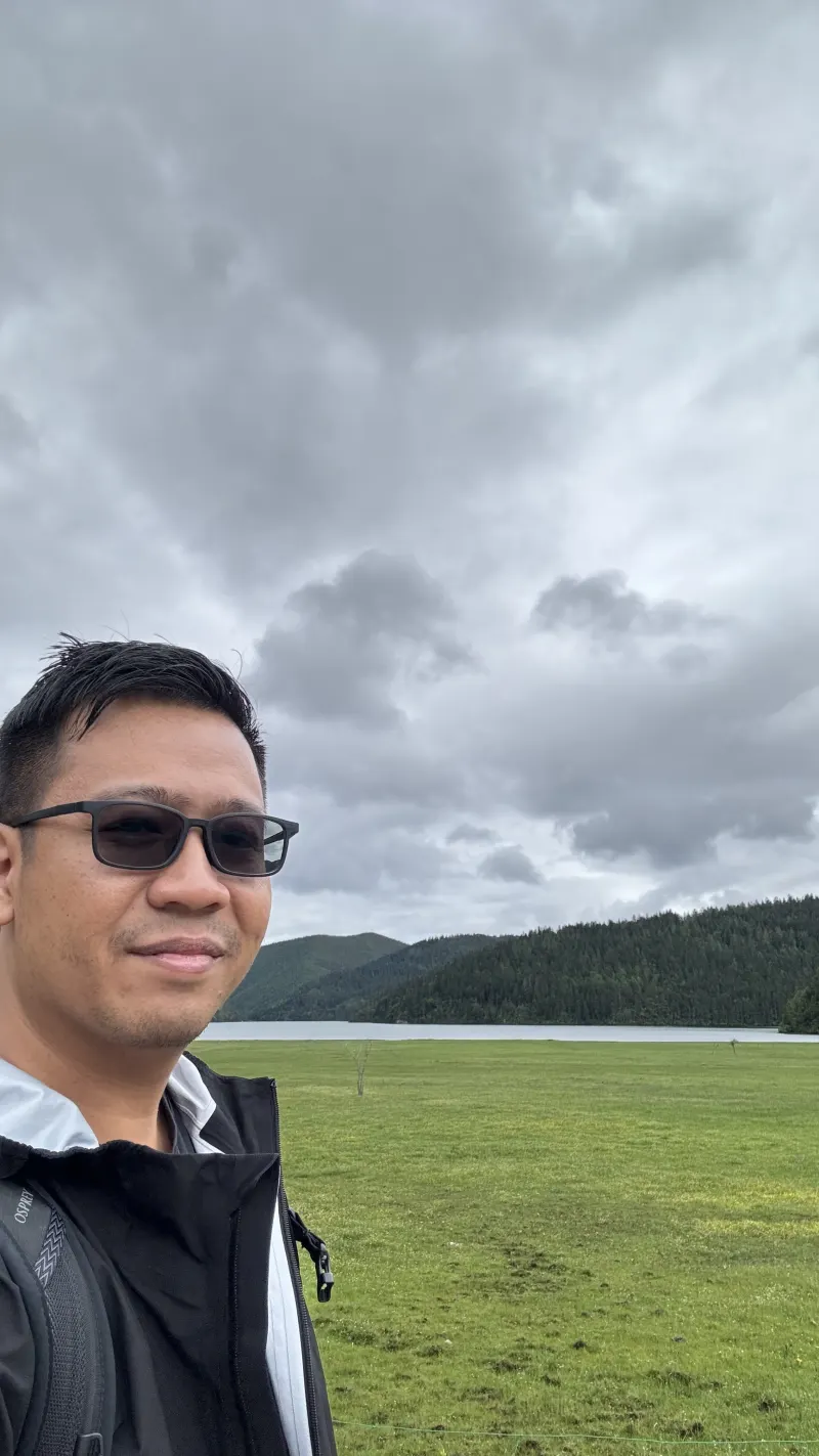 Alpine grassland and dramatic skies