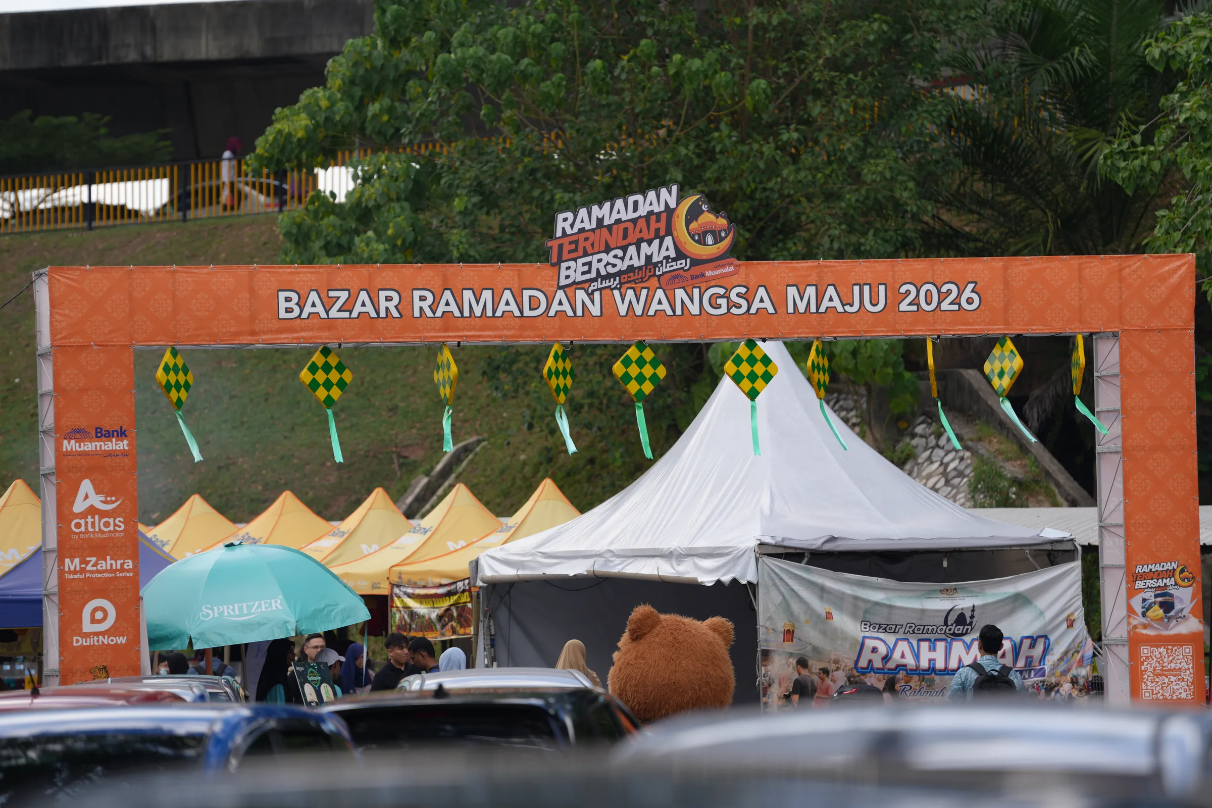 Entrance arch at Bazar Ramadan Wangsa Maju 2026 — ketupat decorations and yellow tents