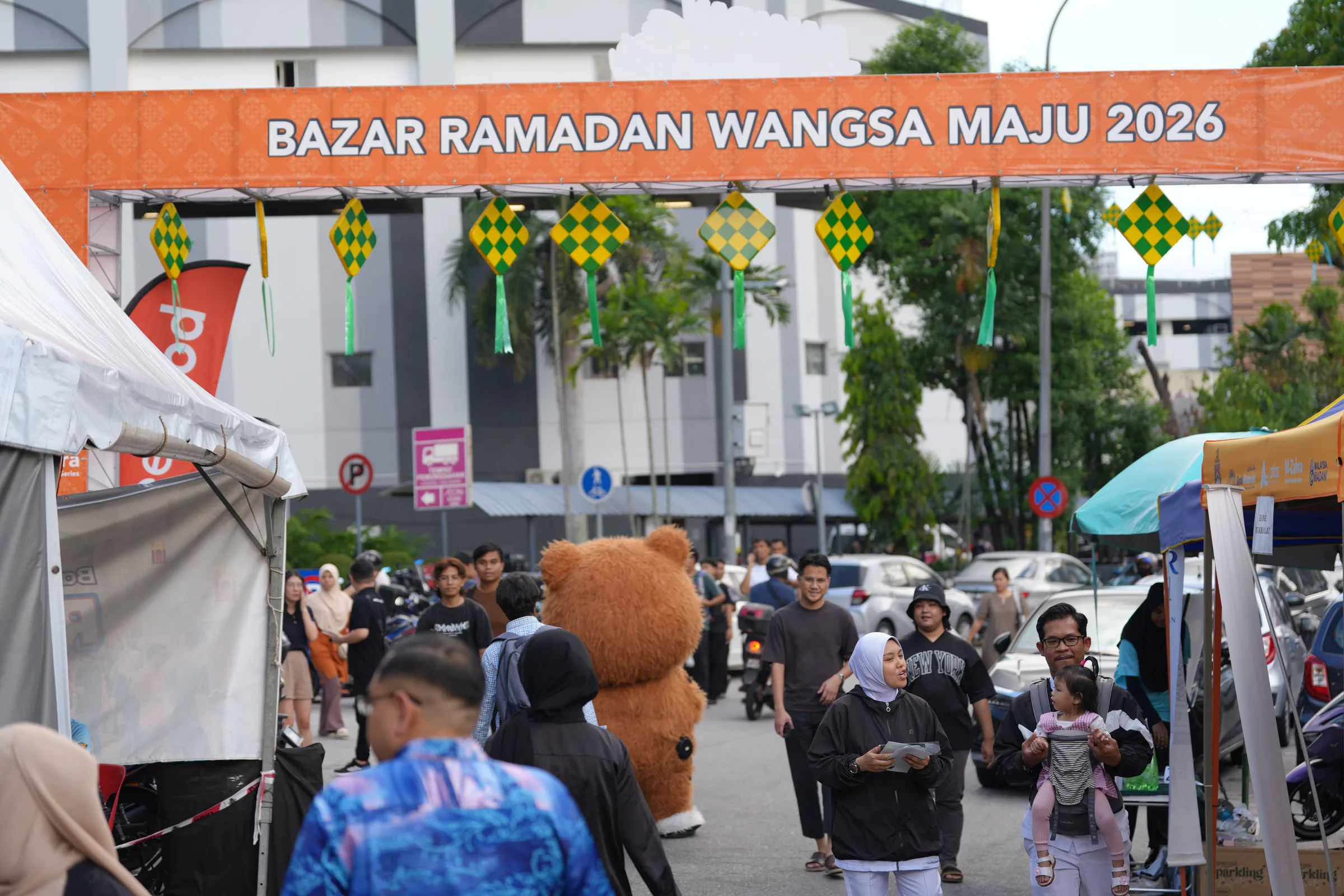 Bazar Ramadan Wangsa Maju 2026 entrance with ketupat decorations and bear mascot