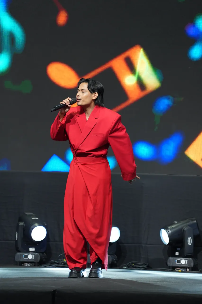 Stage performance under moving lights at the show