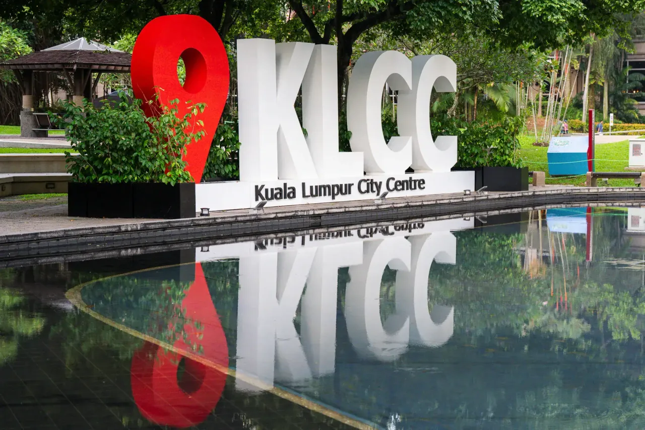 KLCC sign with tower reflection