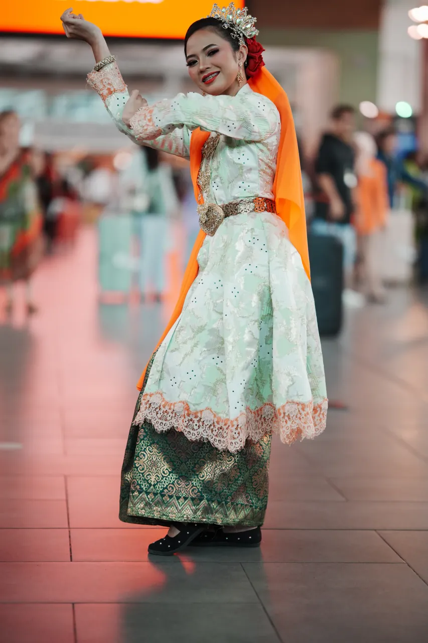 Mid-dance swirl — capturing movement and joy at a Malaysian cultural flash mob