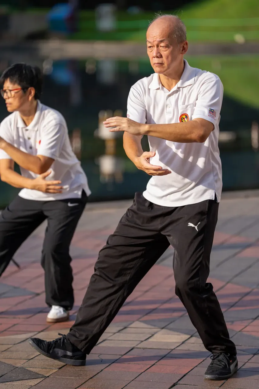 Tai chi by the lake — lifestyle photography at KLCC Park