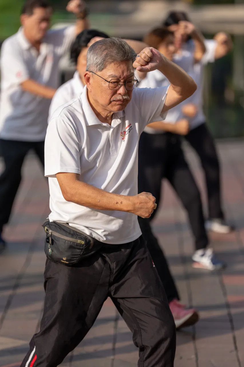 Tai chi at sunrise — morning practice at KLCC Park, Kuala Lumpur